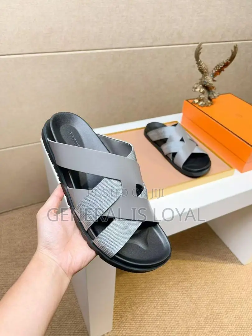 Hermès Kazimir Sandal In Black Calfskin And Woven Ribbon.