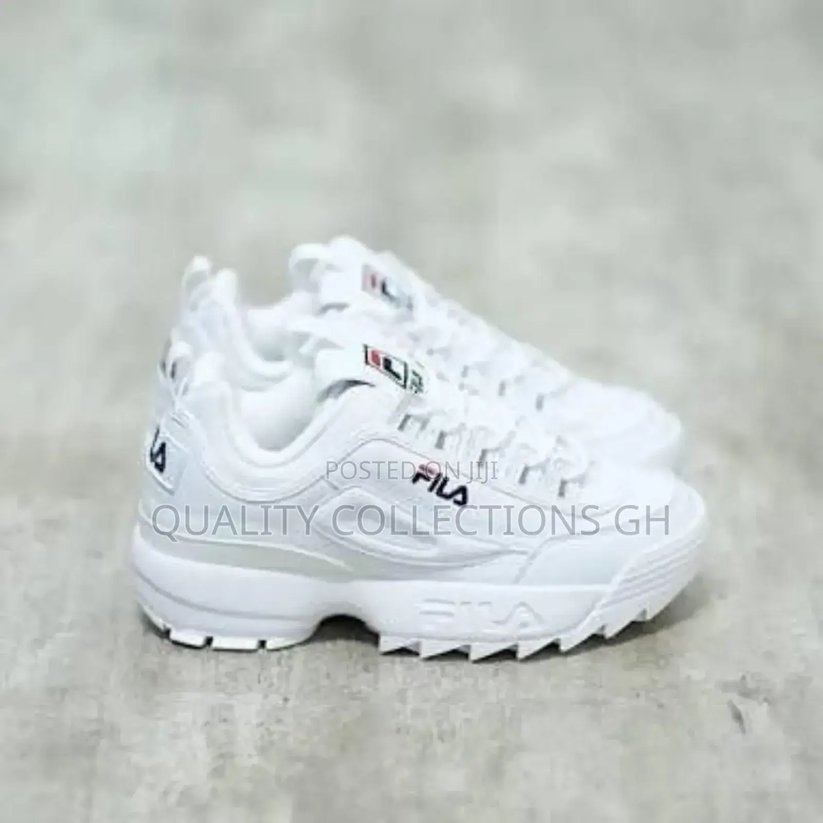 White Fila Disruptor