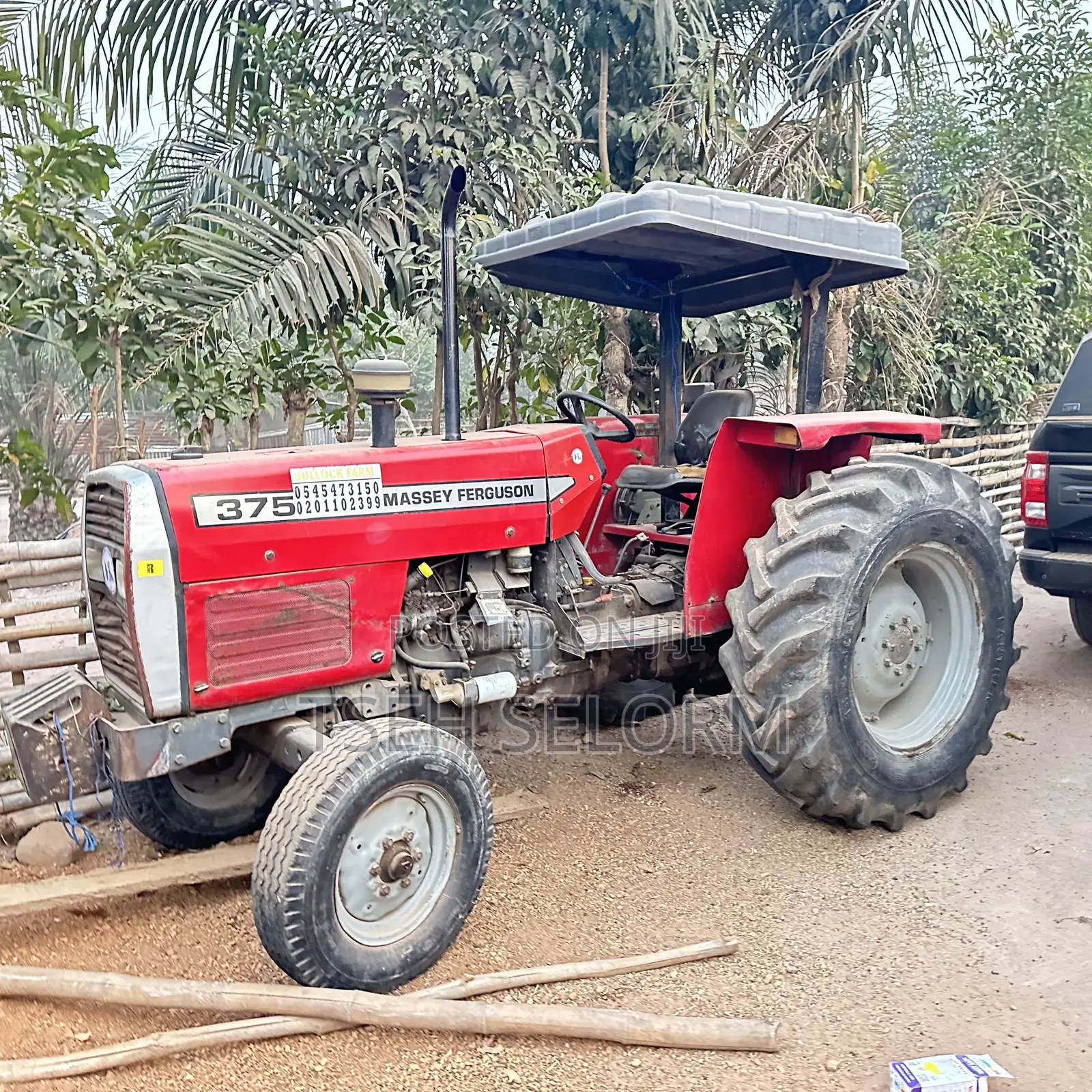 Mf 375 Tractor With Plough