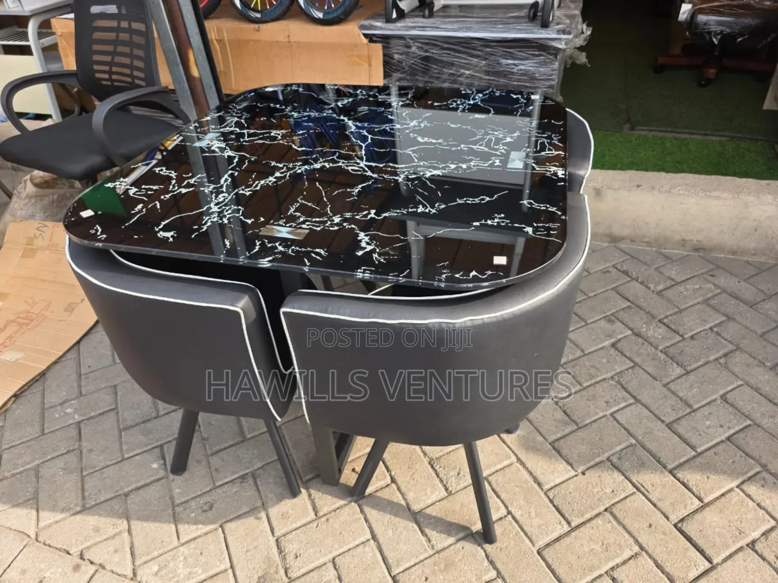 Black Patterned Tabletop and 4 Leather Chair
