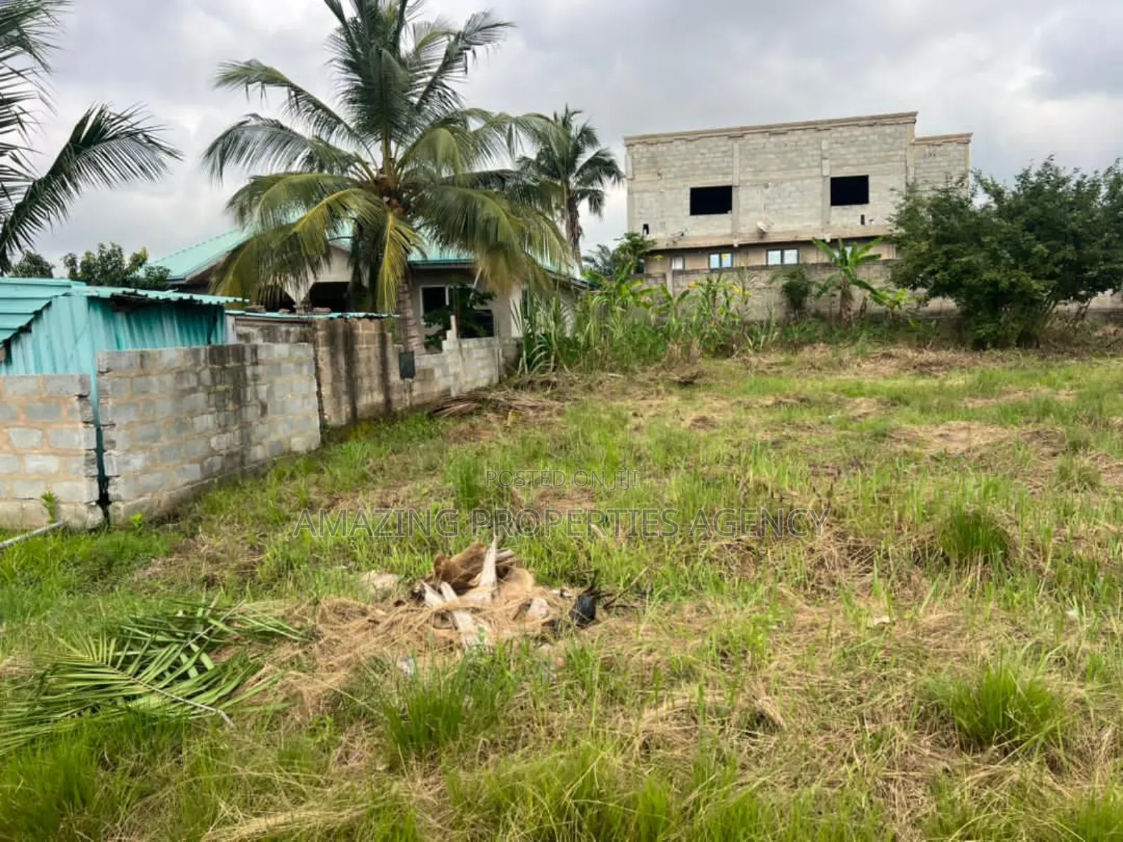 A. Tema Main Road Land for Sale (With Old Building)* • Community 10