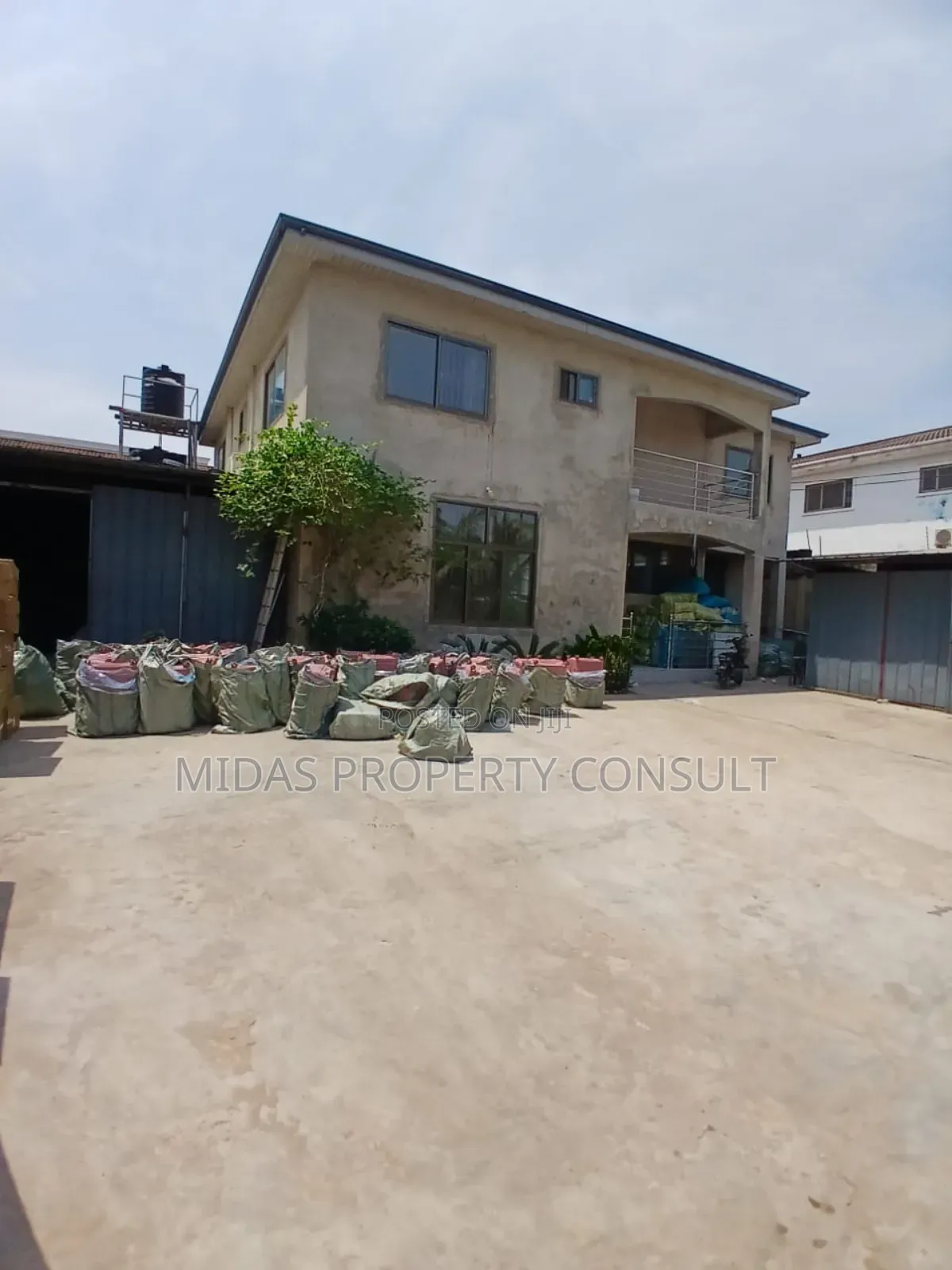 400sqm Warehouse With a 4 Bedroom House for Sale at Spintex