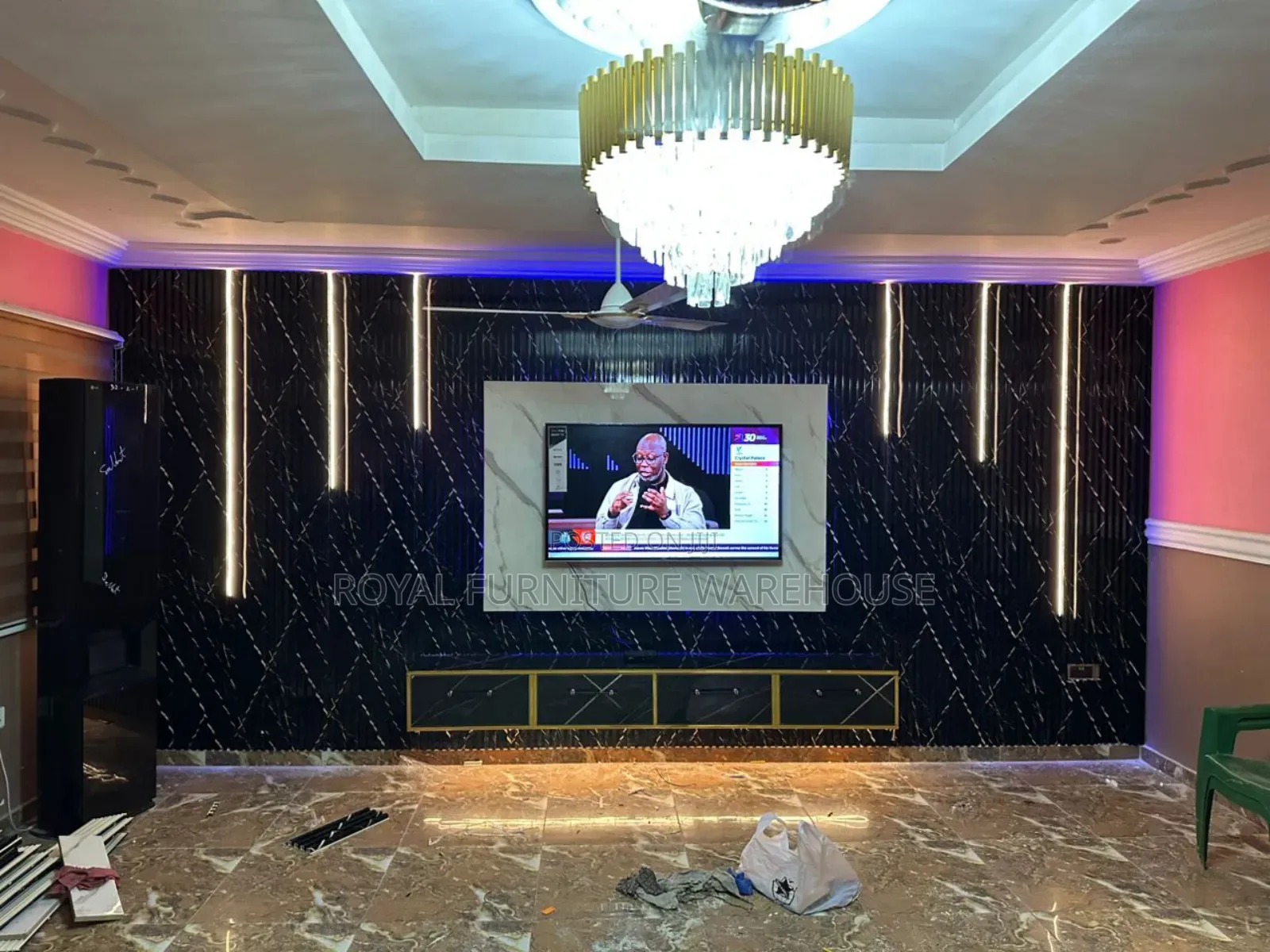 A High-Contrast Tv Wall Unit With Integrated Led Lighting.