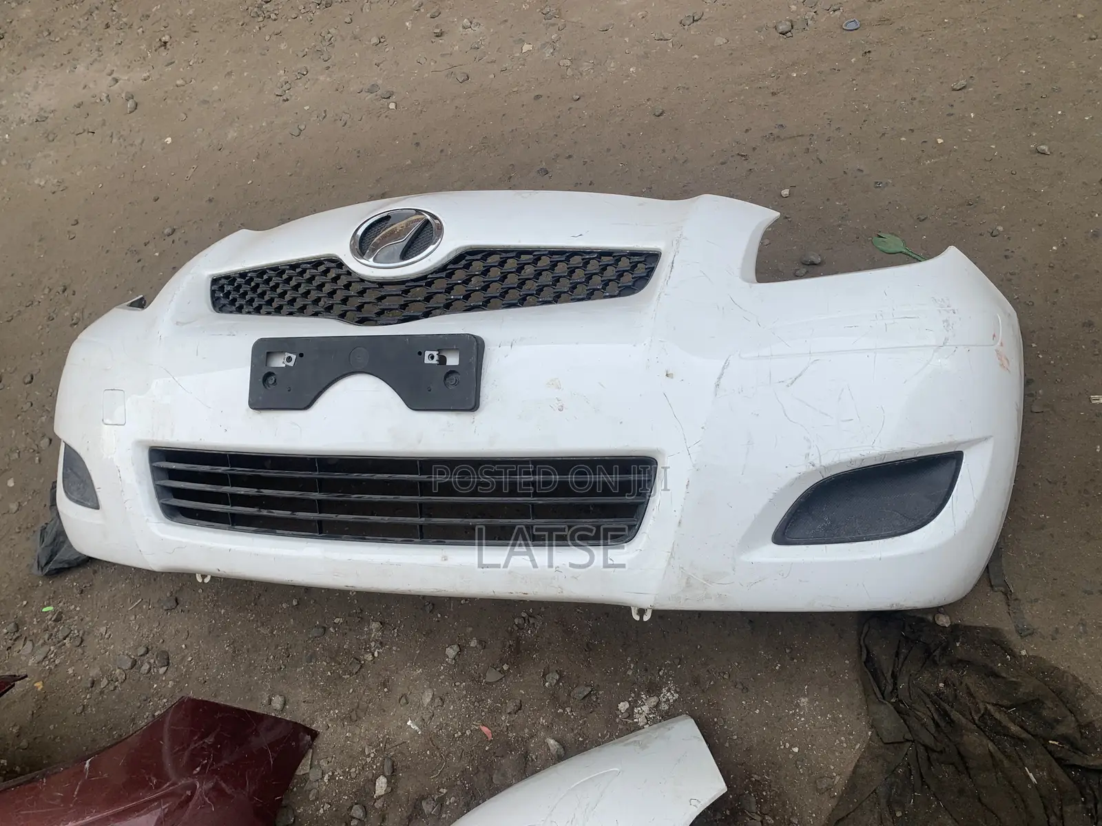 Toyota Vitz 2009-2010 Front Bumper With Fog Light Cover