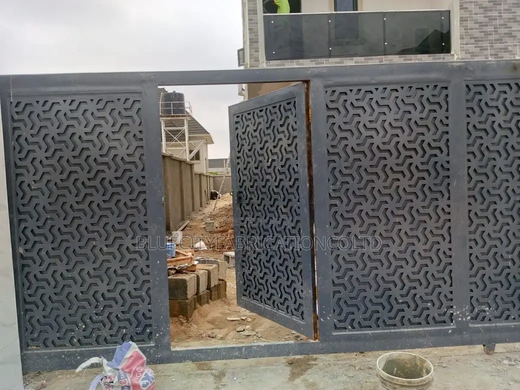16ft Main Gate With Small Door in It