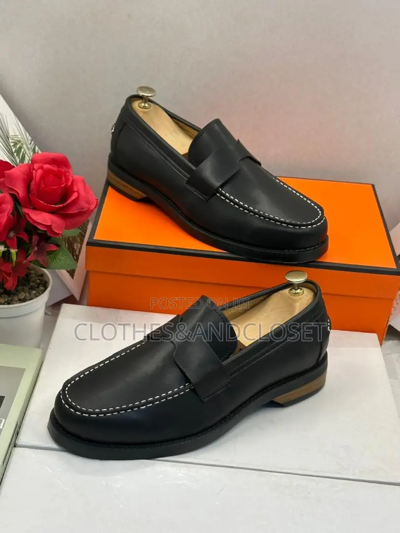 Hermès Black Leather Penny Loafers