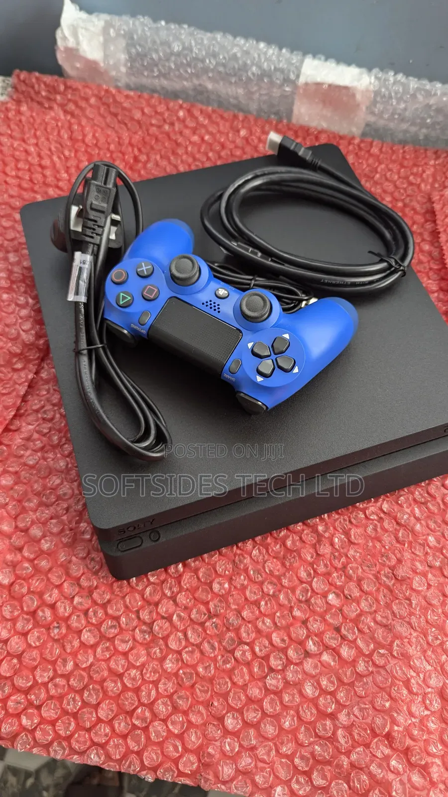 Black Ps4 Slim 500gb With Blue Controller and 8 Games Jailbroken