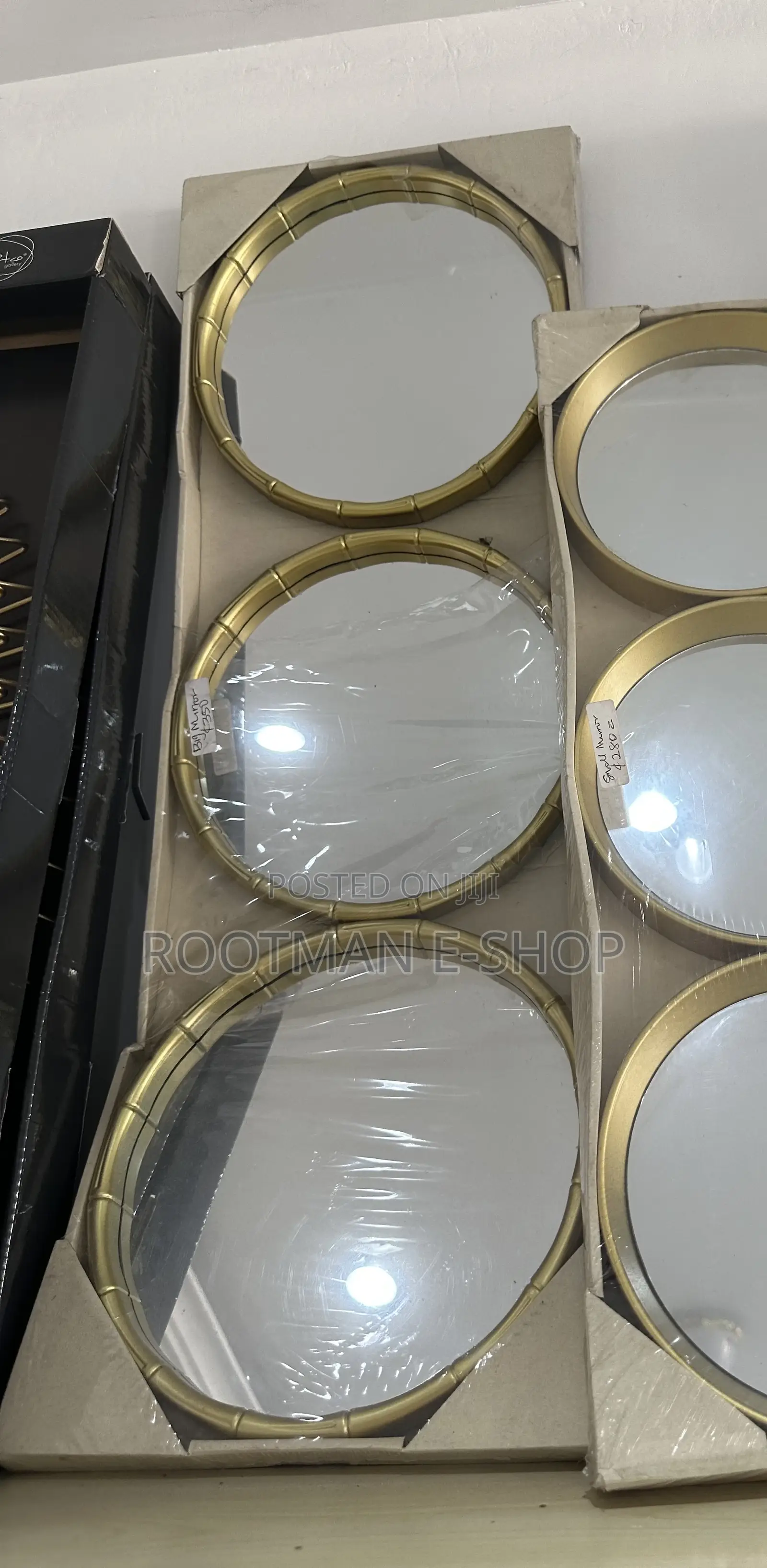 Modern Round Wall Mirrors Featuring a Gold Metal Frame