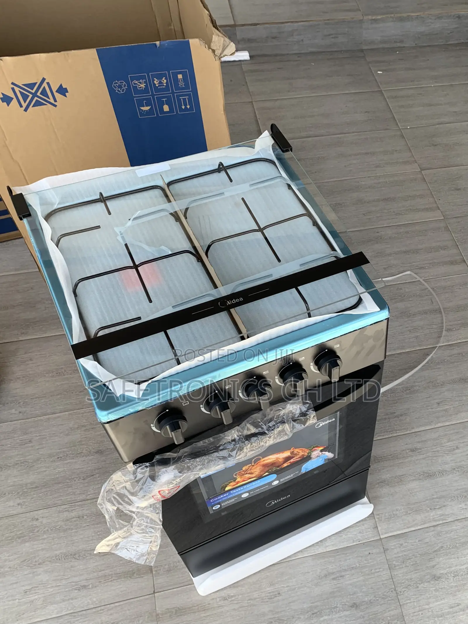 Sealed Premium Midea 4 Burner Gas Cooker Lack Mirror