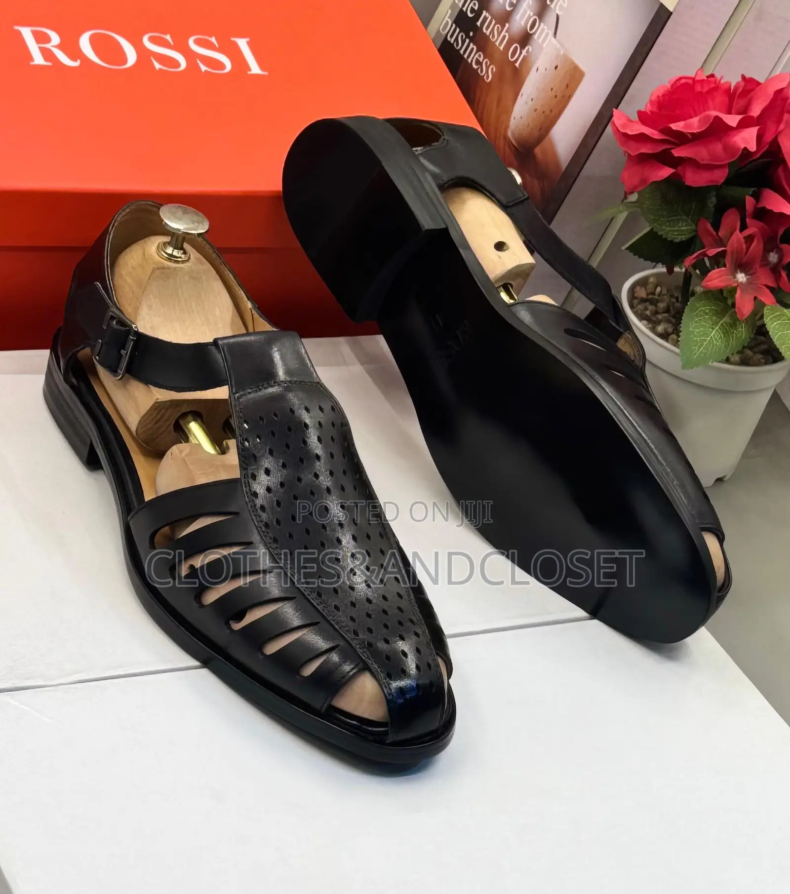 Black Leather Sandals Feature a T-Strap Design