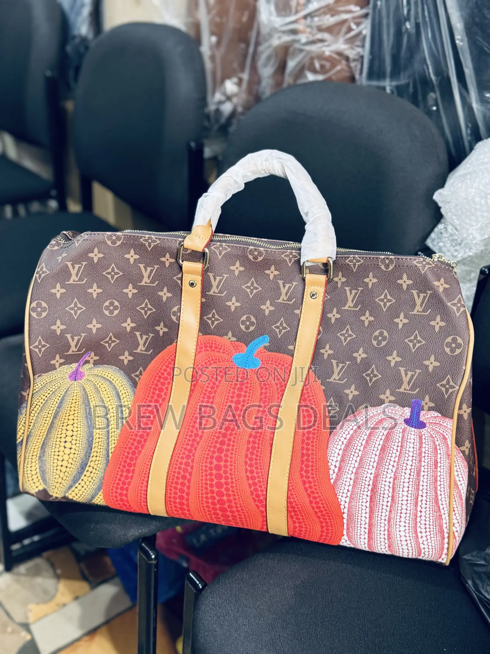 Premium Leather Louis Vuitton Duffle Traveling Bag.