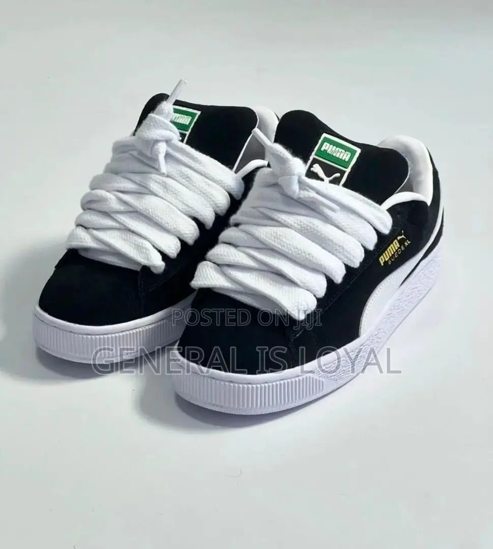 Puma Black and White Sneakers
