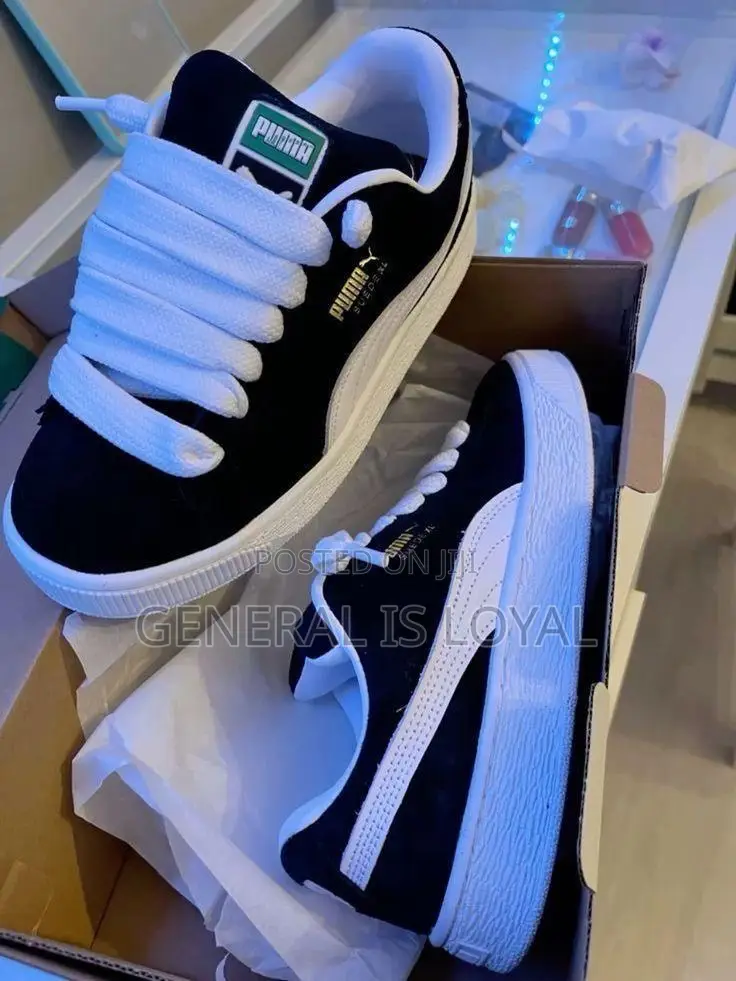 Puma Black and White Sneakers