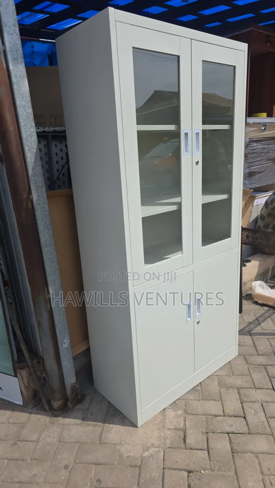 Light Gray Zuo Modern Metal Cabinet With Glass Door and Solid Metal.