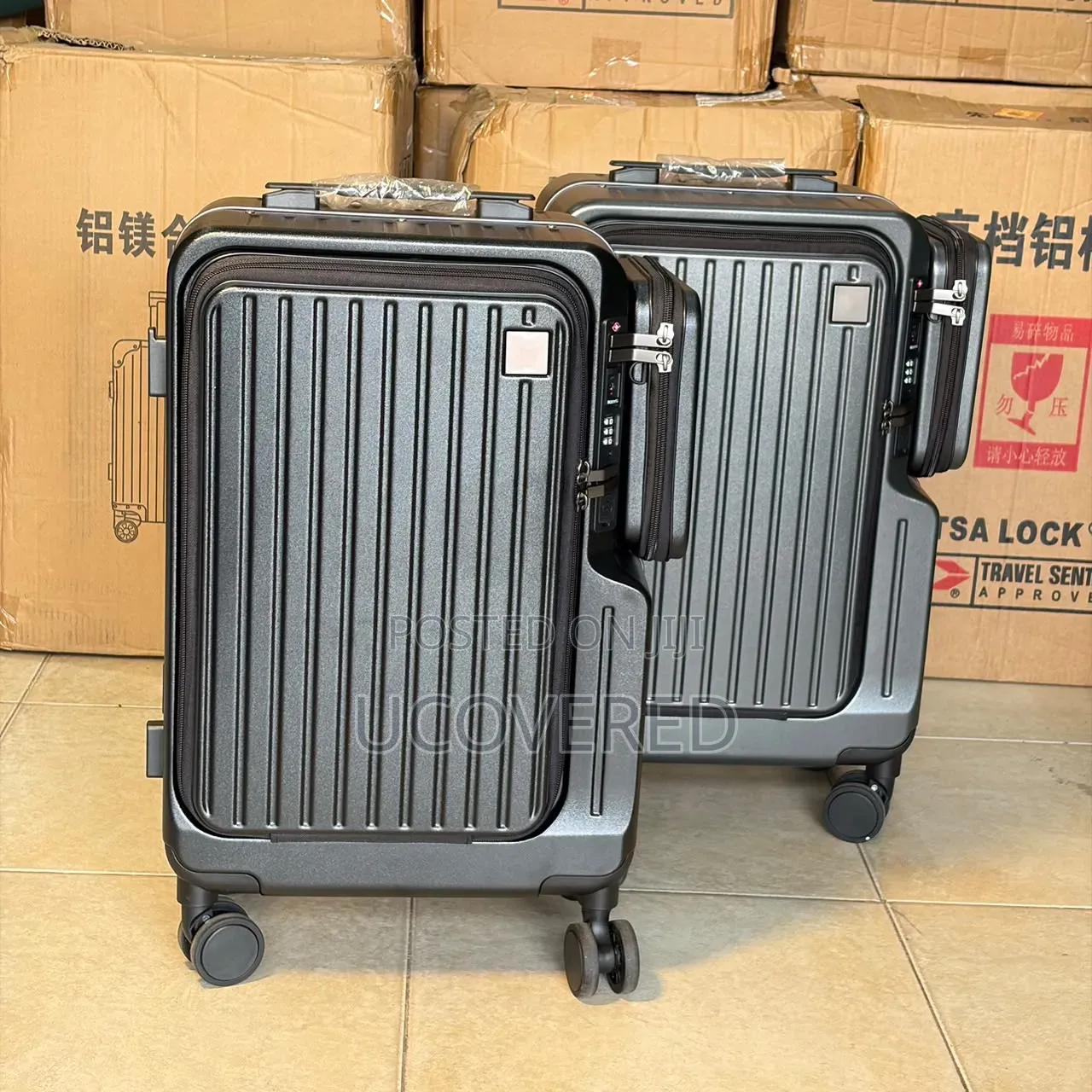 Aluminum Suitcase Features a Distinctive Front-Opening Panel