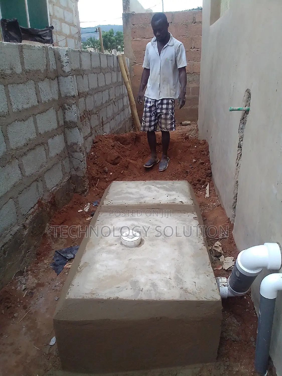Plumbering Work and Building Biodigester Toilet