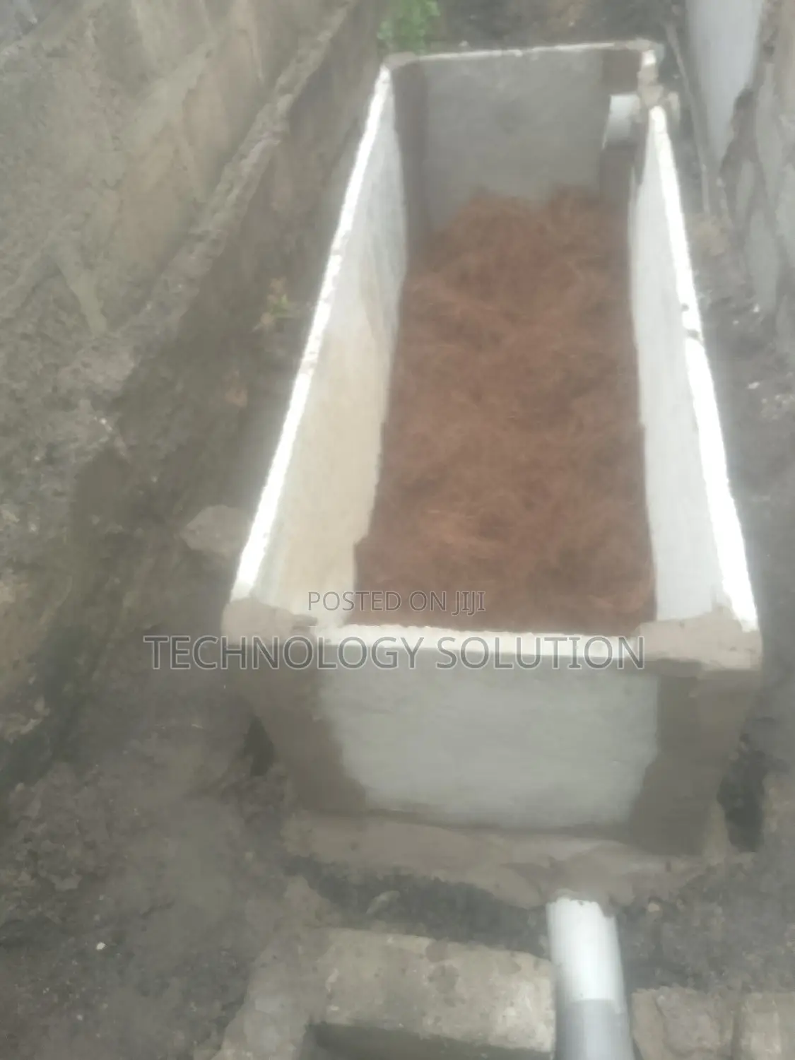 Inside Bathroom With Wc Toilet and Biodigester