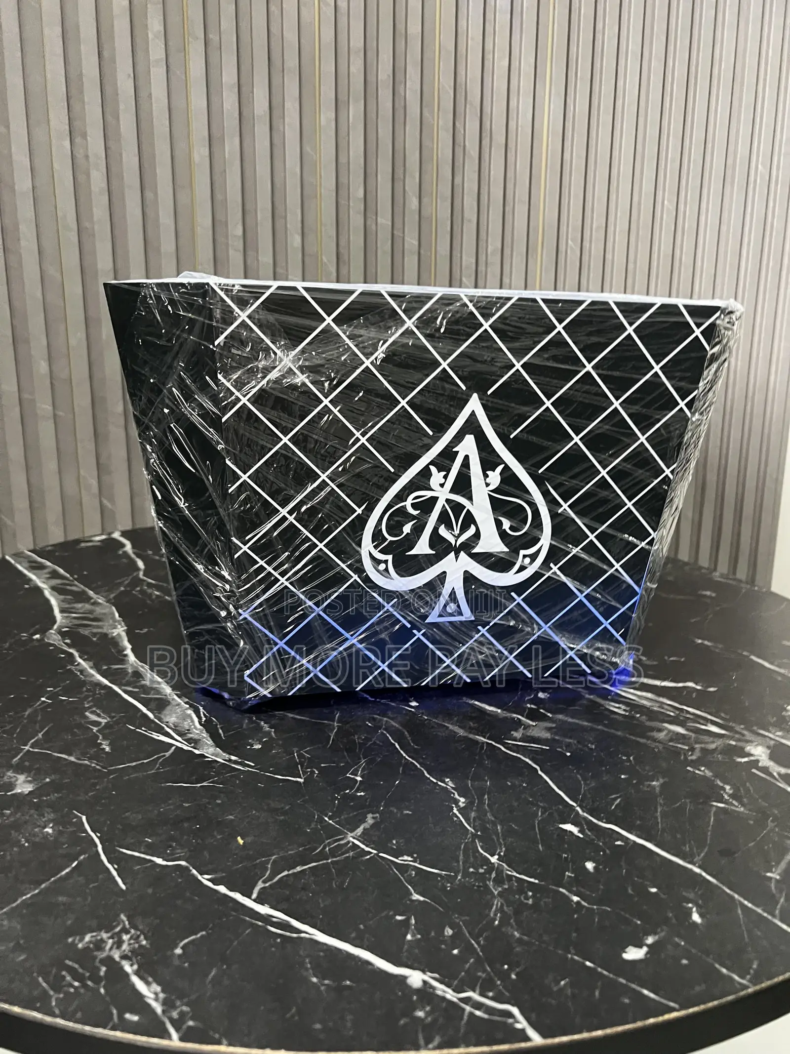 An Armand De Brignac LED Ice Bucket