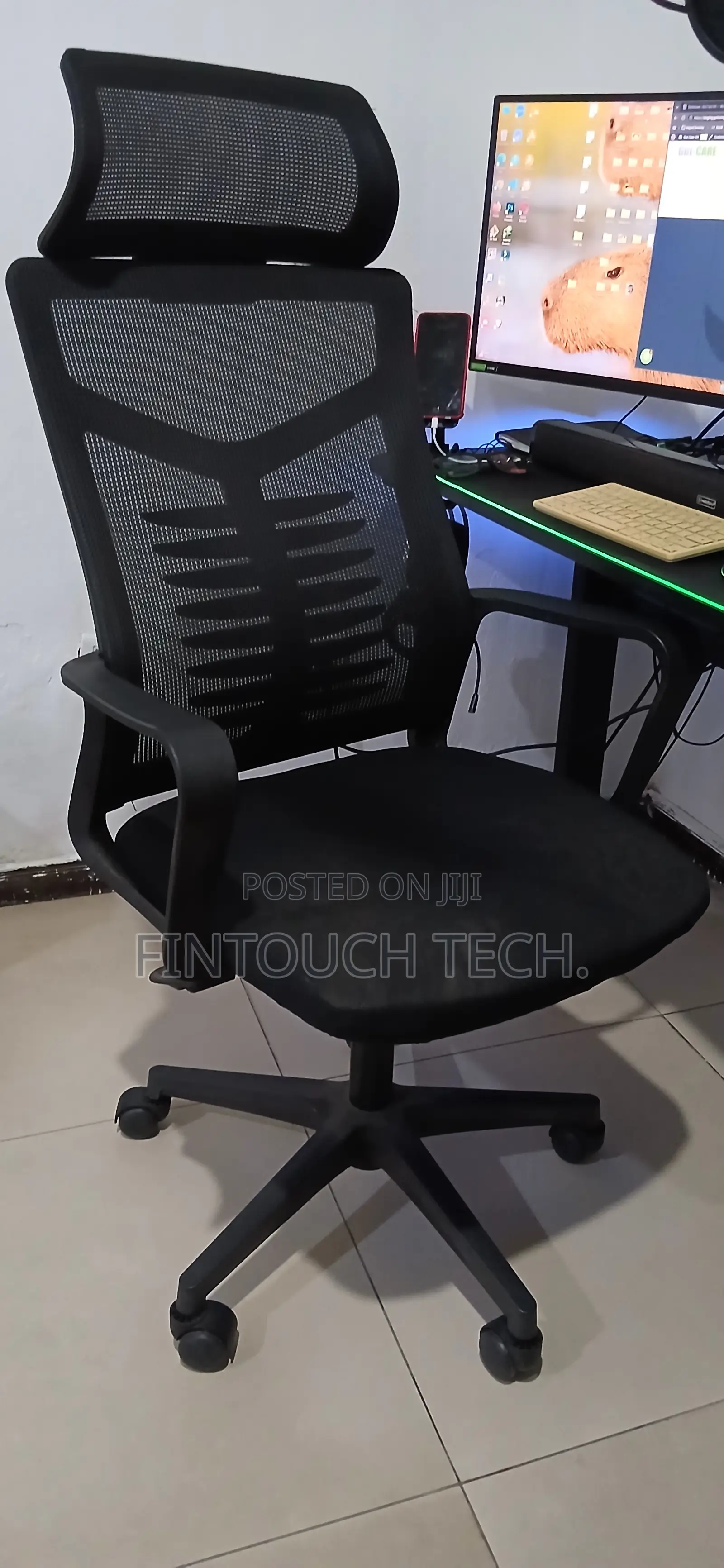Ergonomic Swivel Chair With Durable Mesh and Head Rest for Your Office