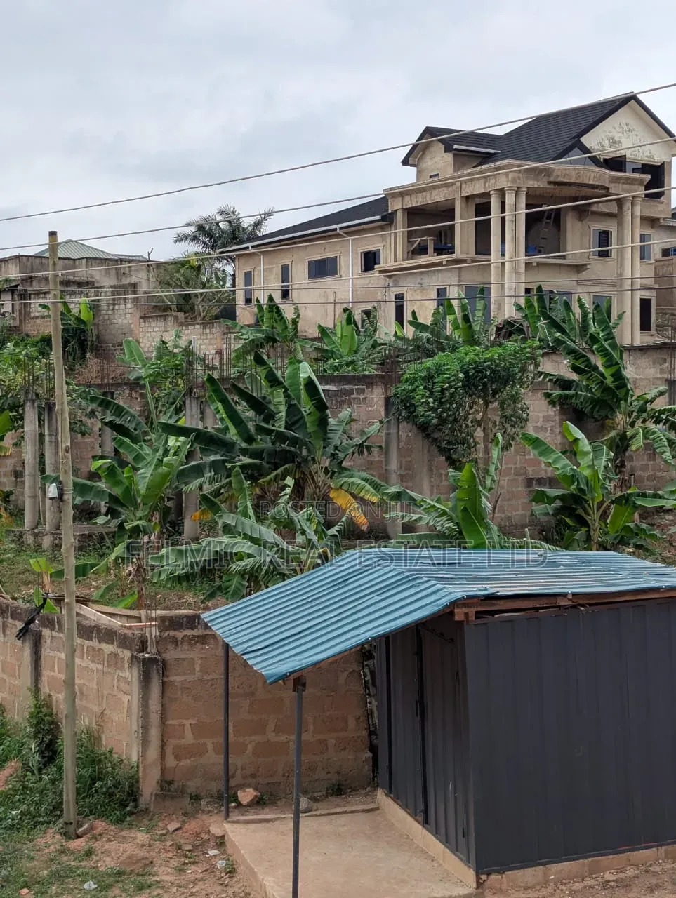 1 Half Plots With a Structure on It at Ayawaso for Sale