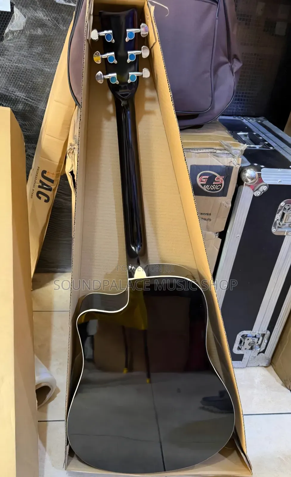 Fender Brand Acoustic Guitar With a Glossy Black Finish.