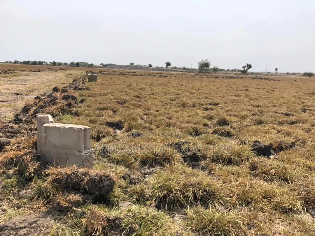 Land Between 2 Communities at Tsopoli for Sale