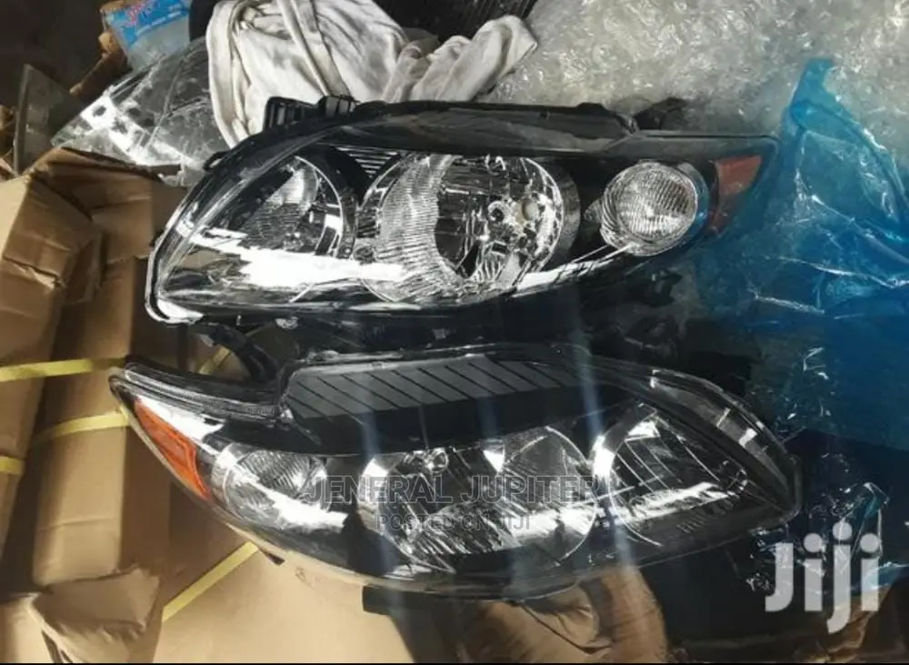 Toyota Corolla 2009 Headlight Black Pair.