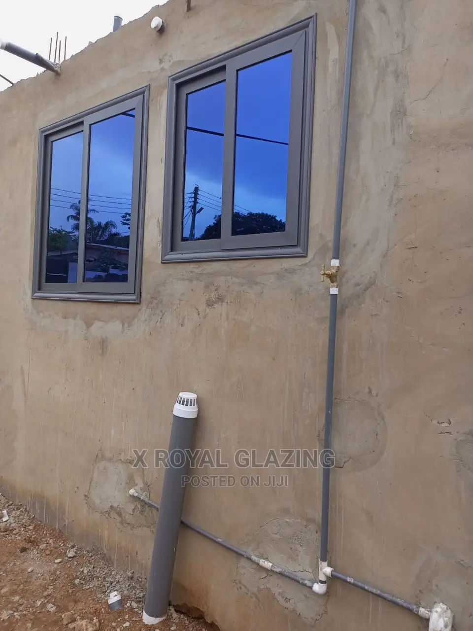 Grey Italian Sliding Windows Well Installed