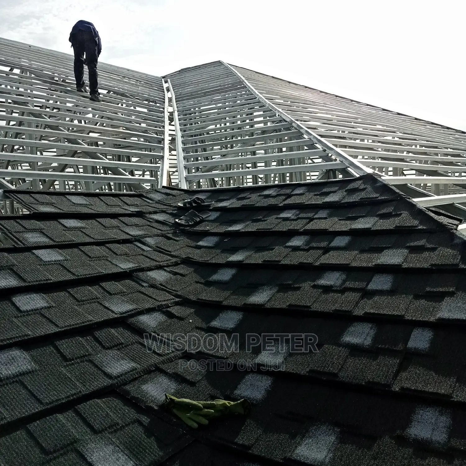 Roofing Stone Coated Tilles Done at Oyalifa Ghan Flag