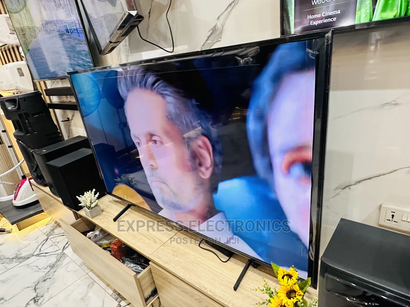 Call  or Text Us for Your 65X7500H UHD Smart Android