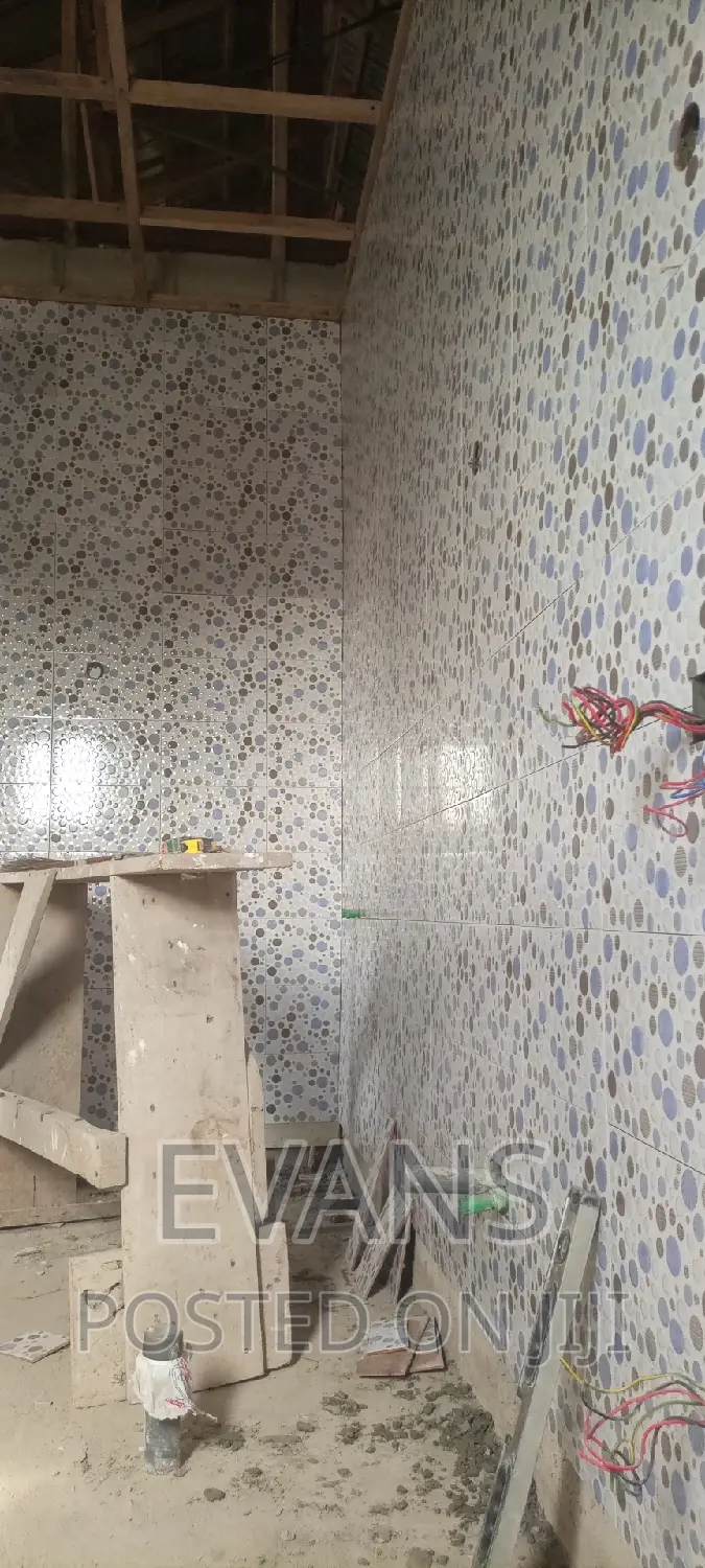 Quality and Affordable Team of Tiles Layer Ready to Work .