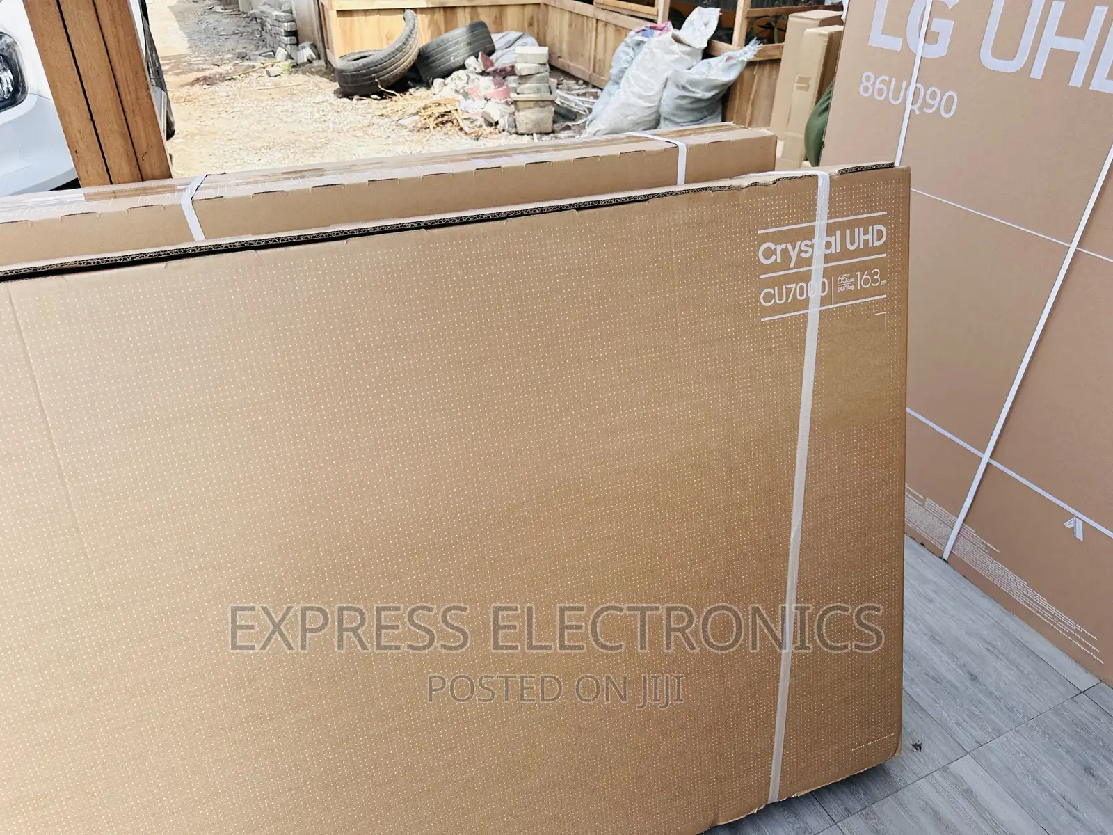 A Glossy Window UHD Smart Samsung 65”Cu8000 Tv