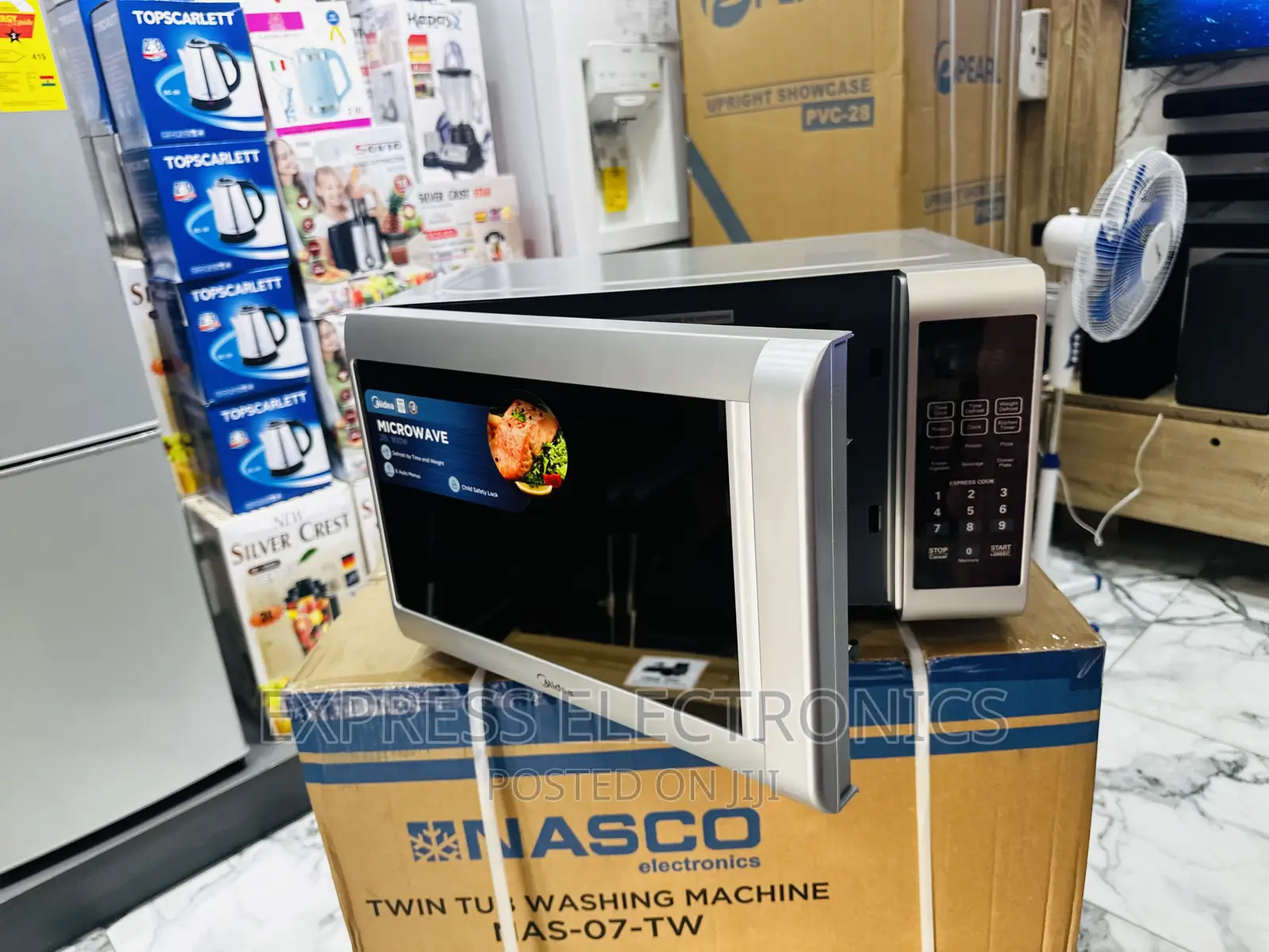 A Year Warranty on Midea 28L. EM925ETB Microwave