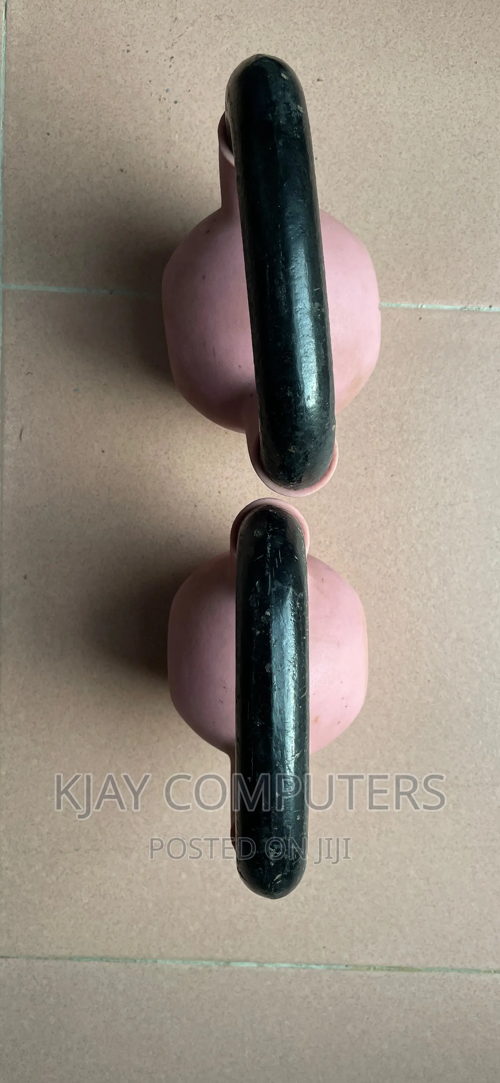 A Pair of 6 Kg Rubber Kettle Bells