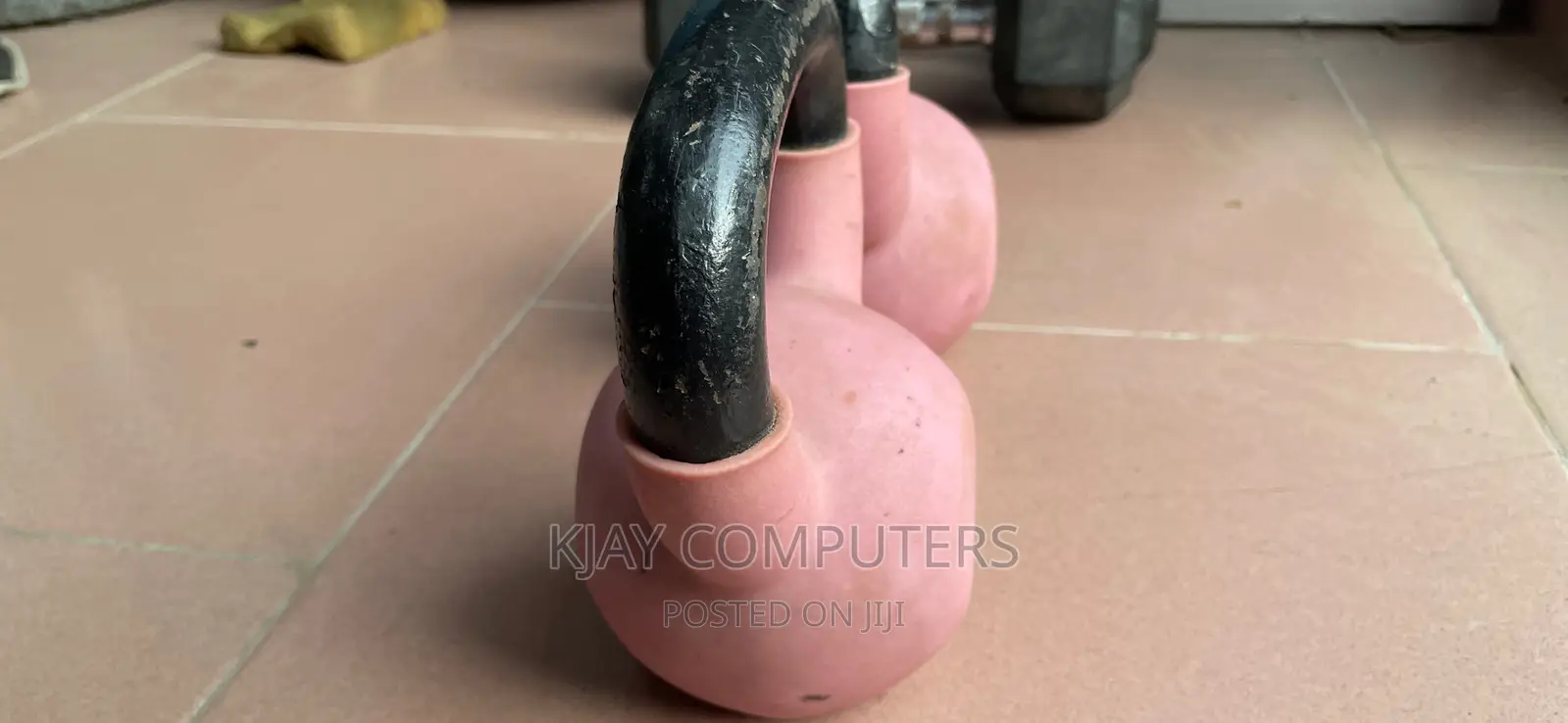 A Pair of 6 Kg Rubber Kettle Bells