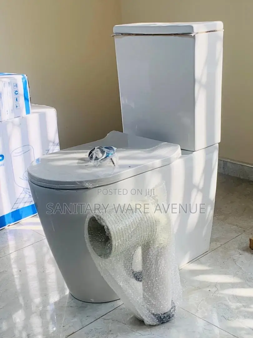 Water Closet - Slim Tank Toilet - S-Trap Toilet Seat