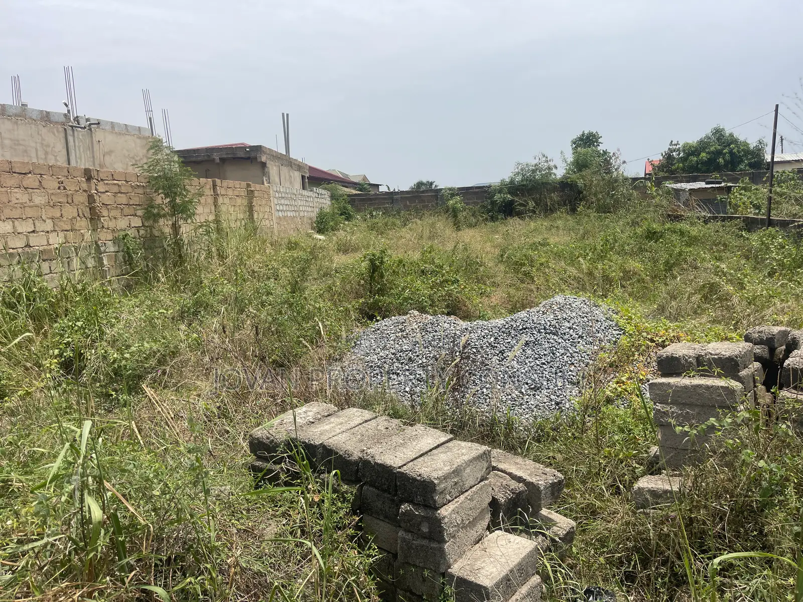 Half Plot for Sale at Amasaman Cocoboard 170,000 Cedis