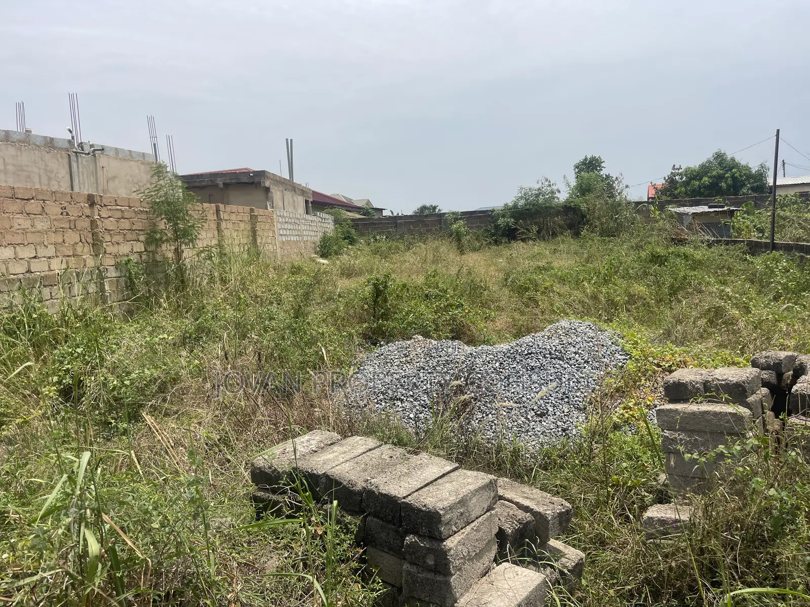 Half Plot for Sale at Amasaman Cocoboard 170,000 Cedis