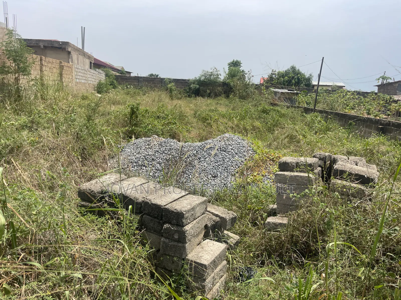 Half Plot for Sale at Amasaman Cocoboard 170,000 Cedis