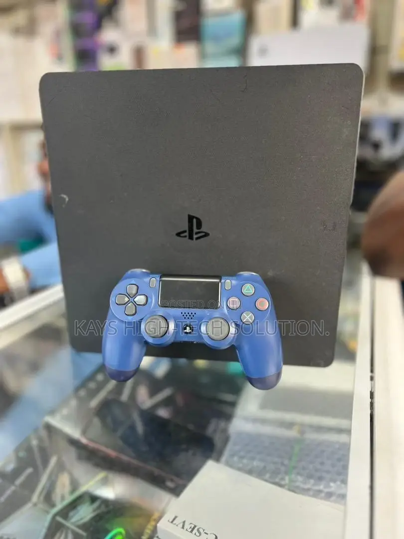 Playstation 4 Slim With 2 Controllers and New Games