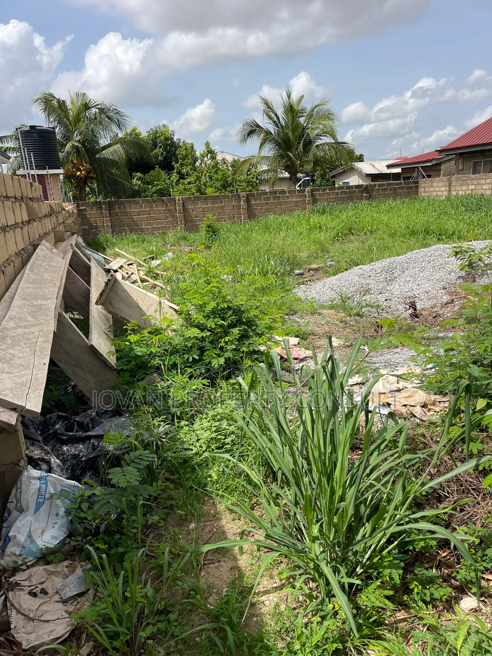 Wall and Gated Land for Sale at Amasaman 480,000 Cedis