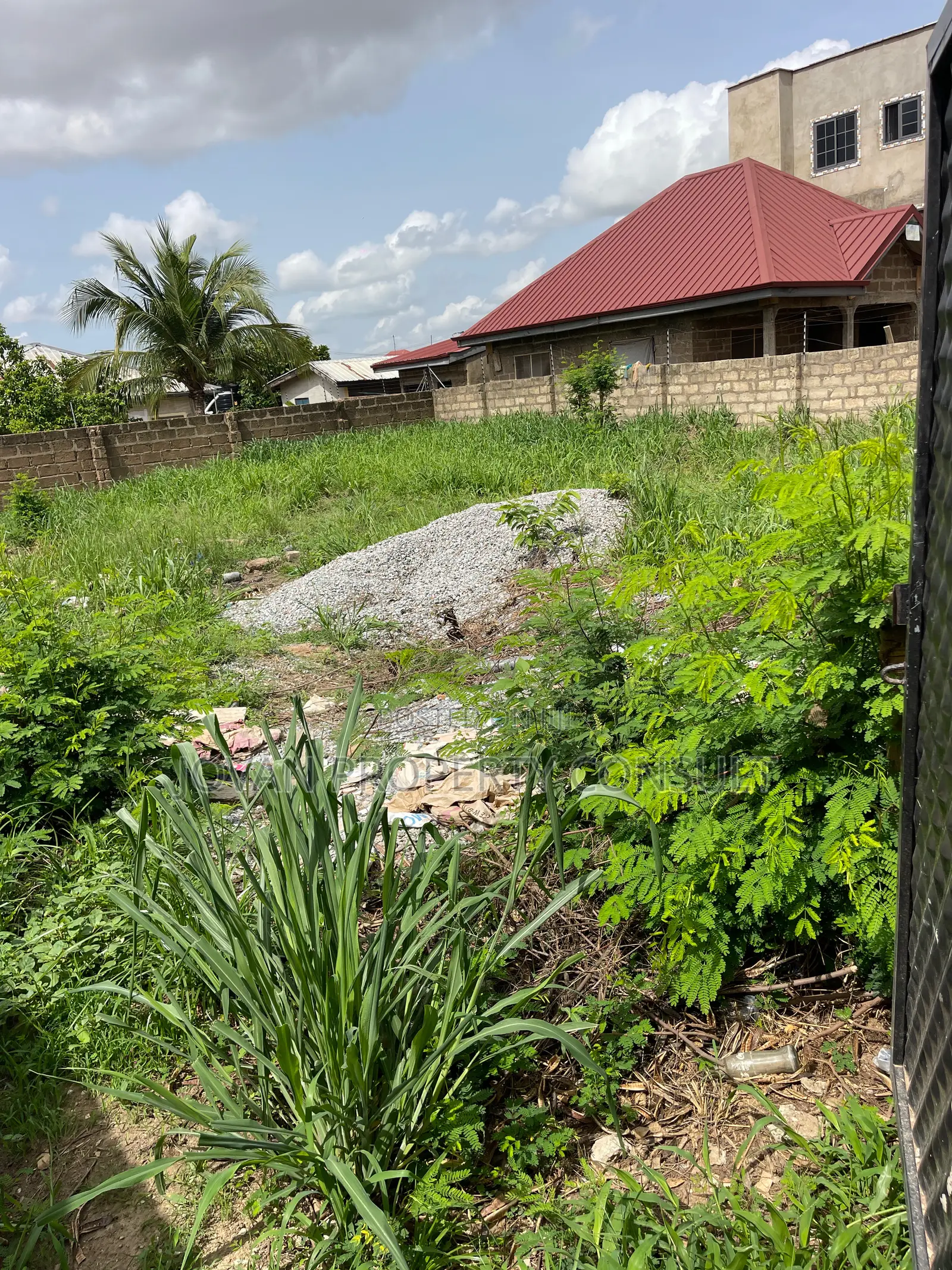 Wall and Gated Land for Sale at Amasaman 480,000 Cedis