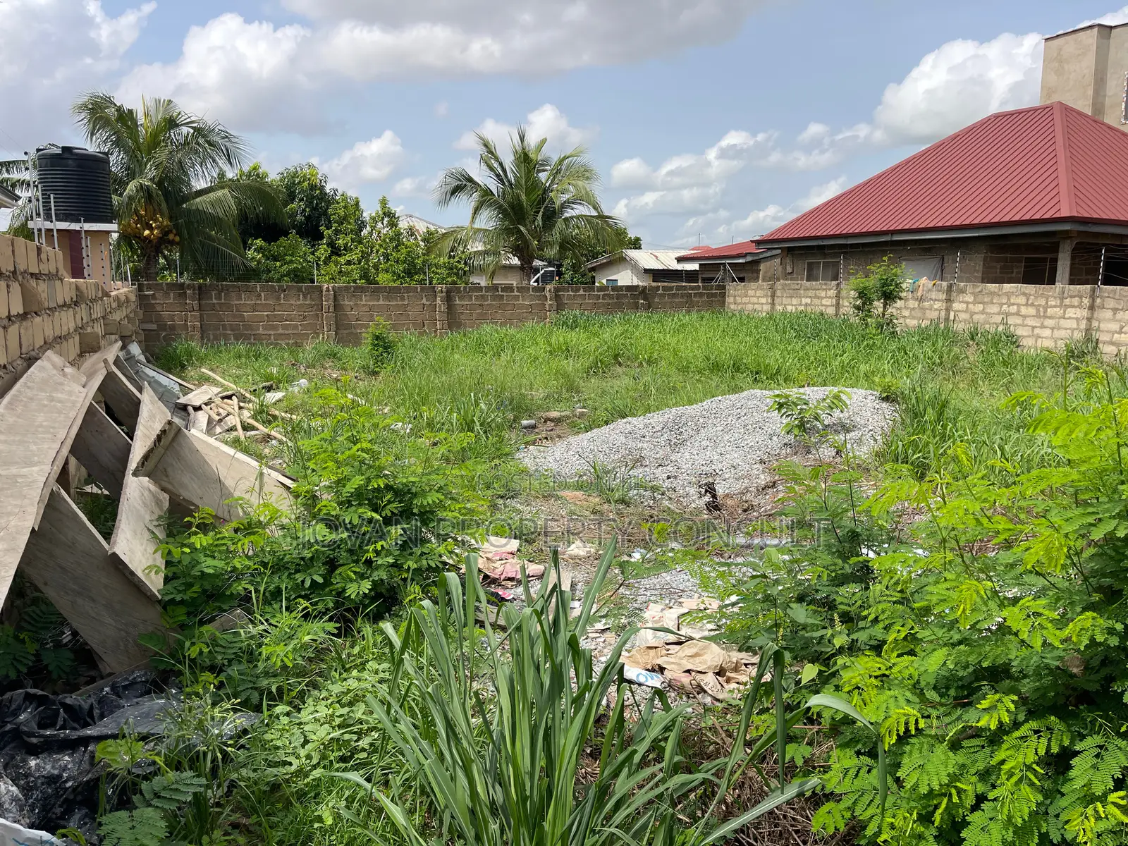 Wall and Gated Land for Sale at Amasaman 480,000 Cedis