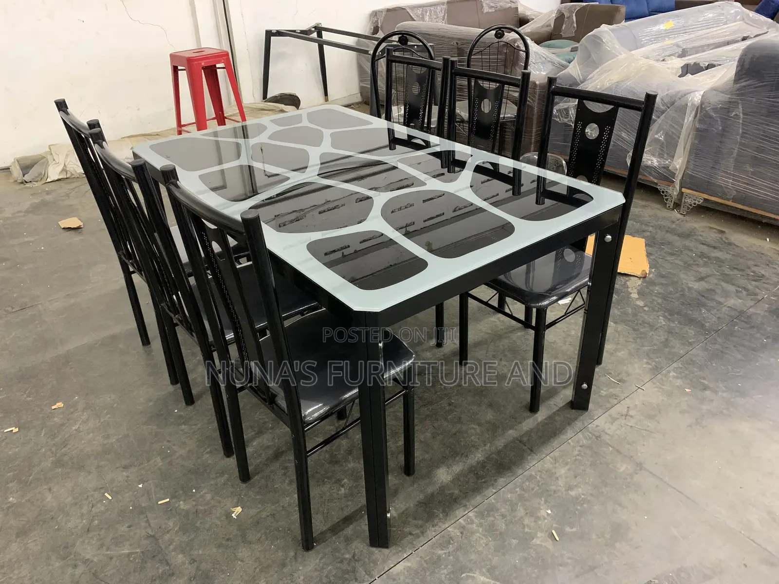 A Dining Table With 6 Chairs ( Glass )