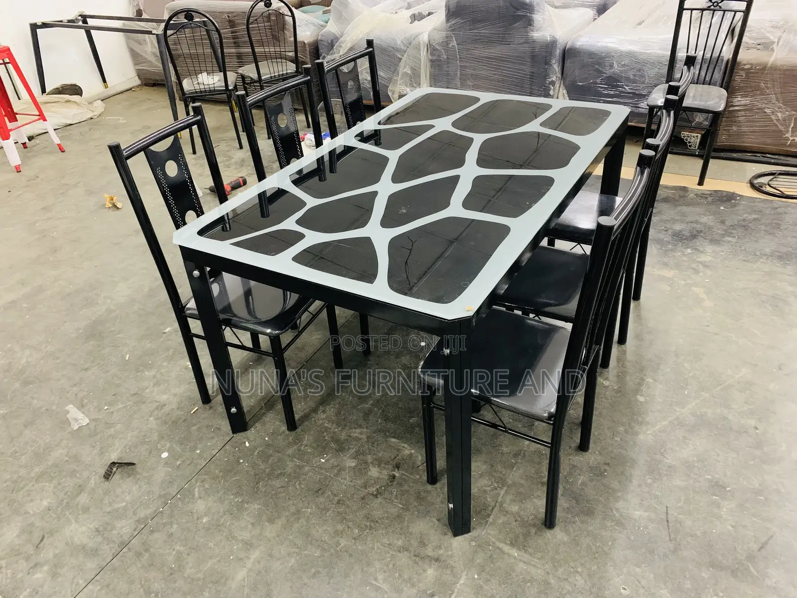 A Dining Table With 6 Chairs ( Glass )