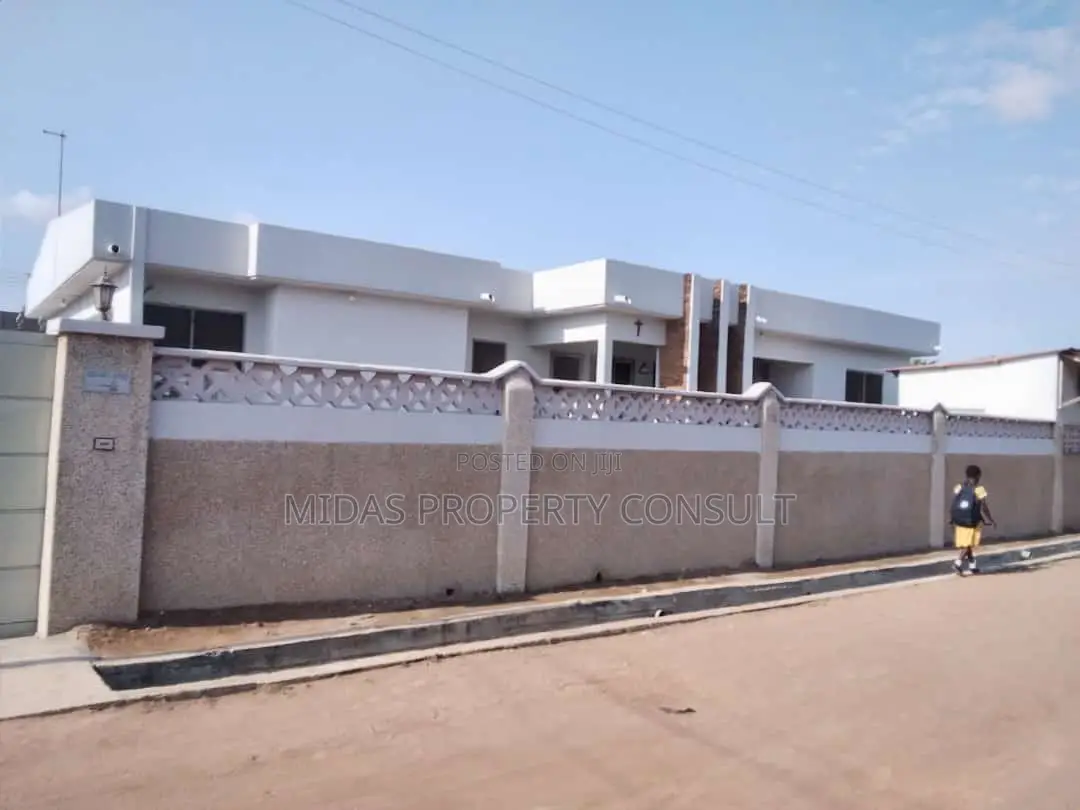 98x100ft Land With a House for Sale at Adenta Village