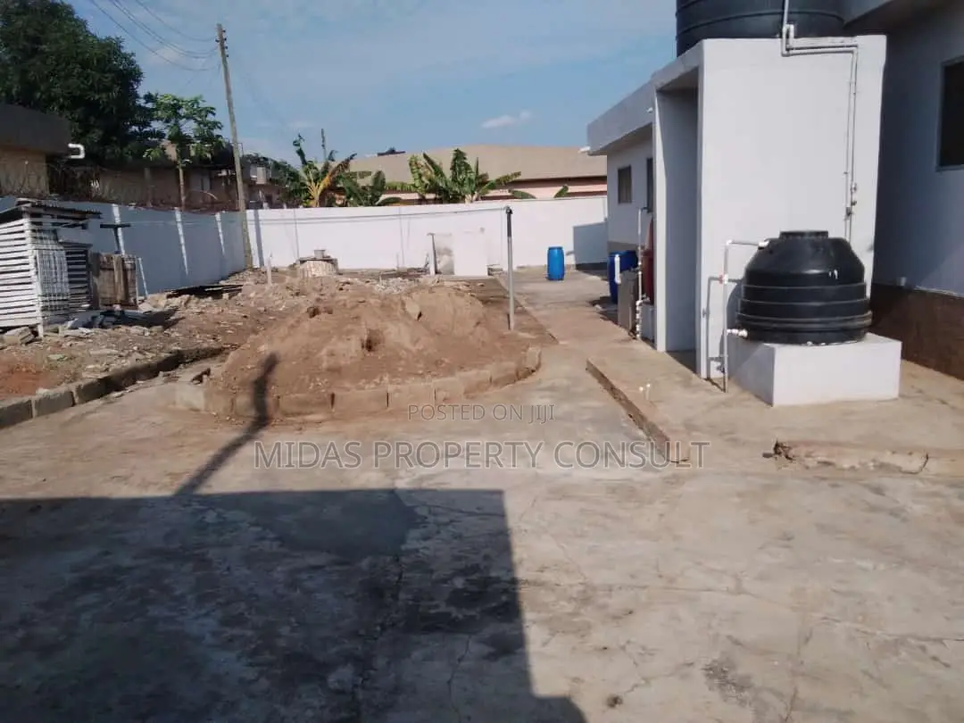 98x100ft Land With a House for Sale at Adenta Village