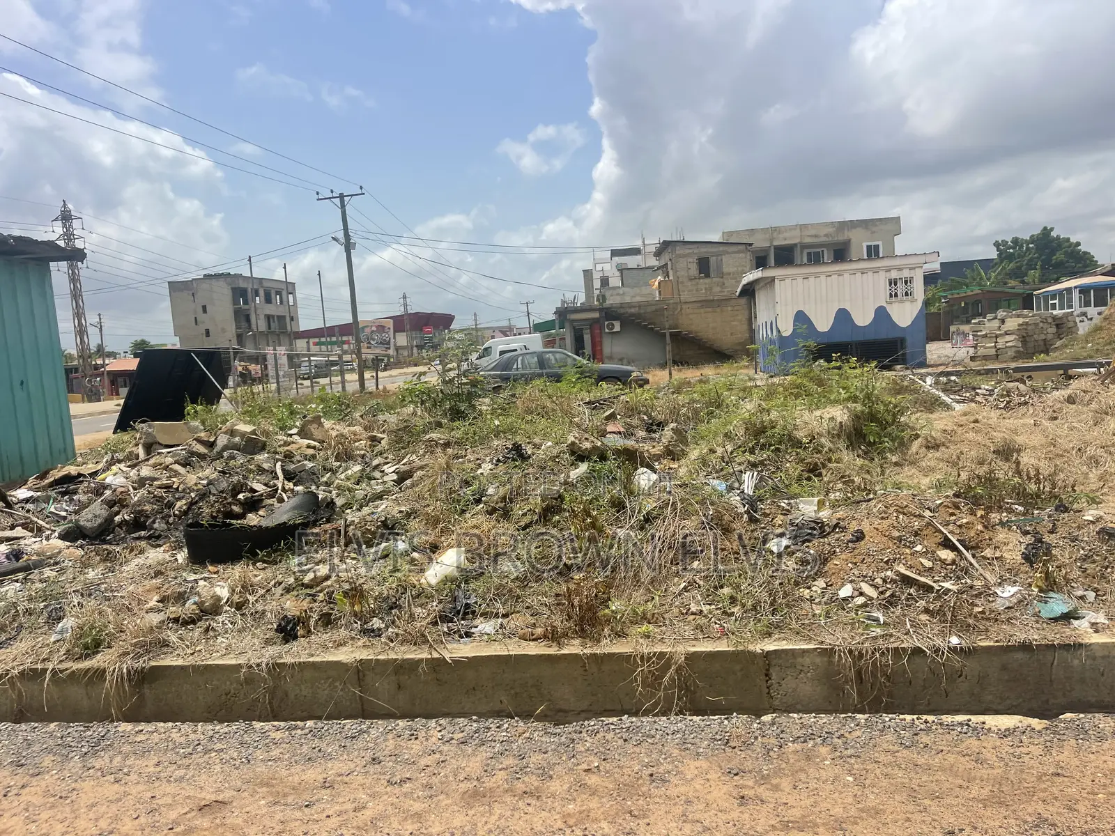 A Main Roadside Plot for Sale From Botwe SCH to Melcom