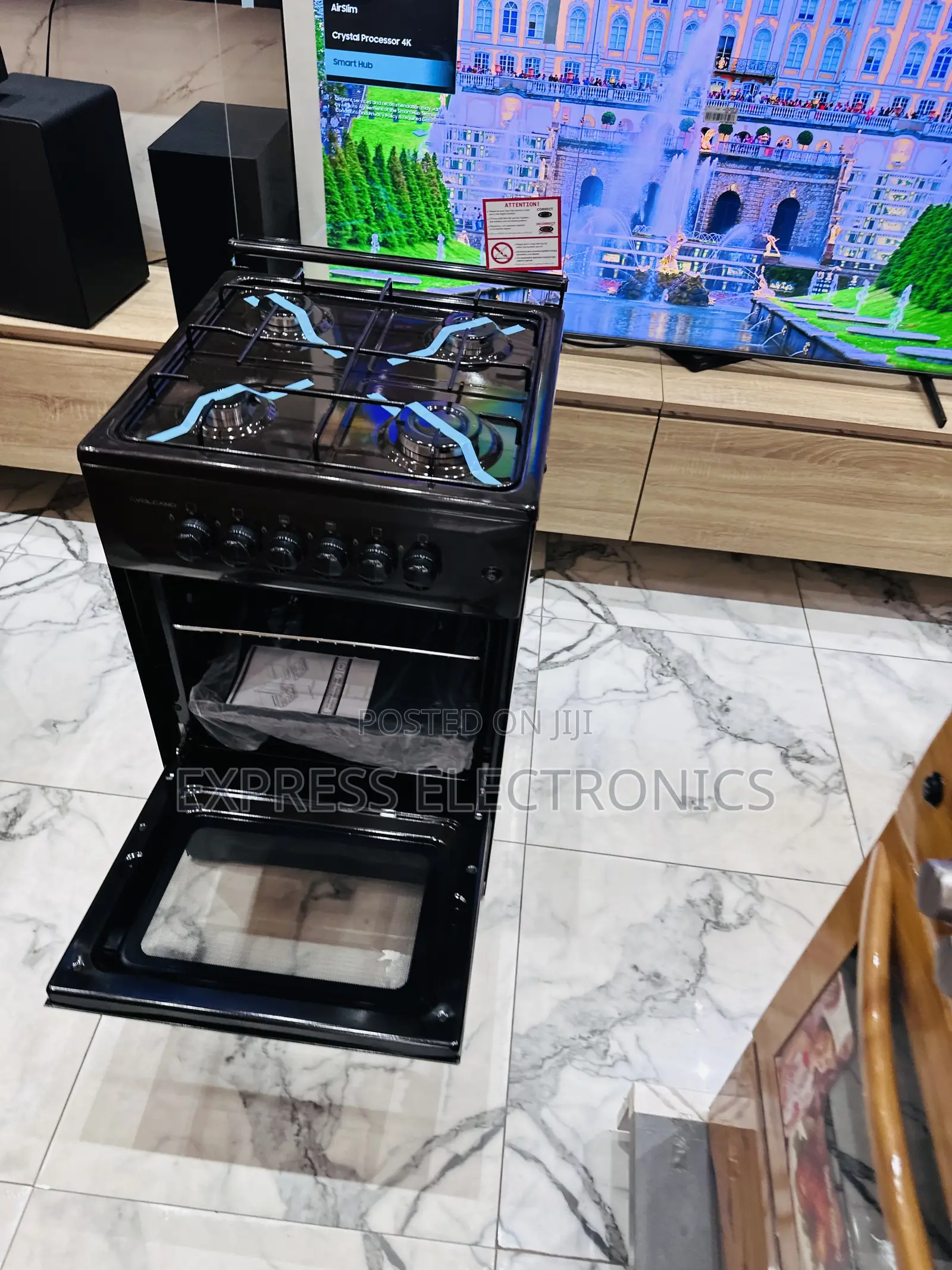 Black Volcano 4burner 50/50 Oven Stove