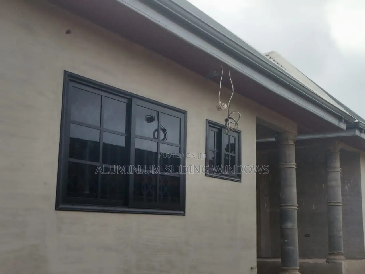 Aluminium Sliding Window Black Frame and Dark Glass
